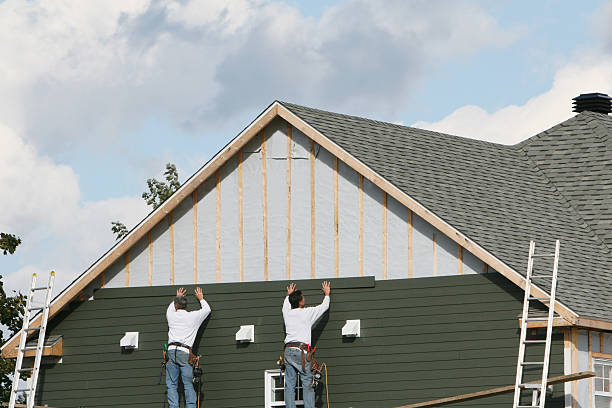 Professional Siding Installation technician working in Guilford, IN